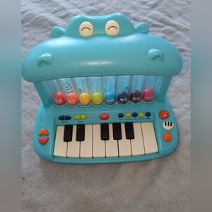 B. – Toy Keyboard – Play Piano